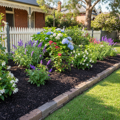 Well-maintained garden bed with fresh mulch